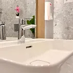 Апартаменти Skyline Glow - Chic 1br Northern Business Hub Area Бухарест